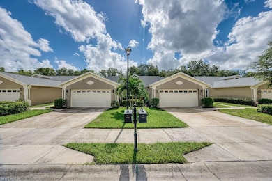 Single story home featuring stucco siding, concrete driveway, and a garage