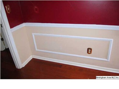 This home has nice wood trim in the entry with win