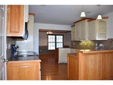 Kitchen w/Custom Cabinetry & Tilework