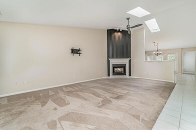 OPEN CONCEPT LIVING ROOM WITH FIREPLACE