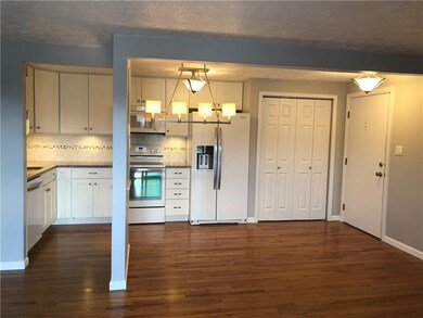 Gorgeous hard wood flooring, open floor plan and c