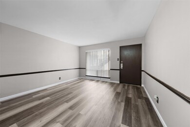 Spare room with hardwood / wood-style flooring