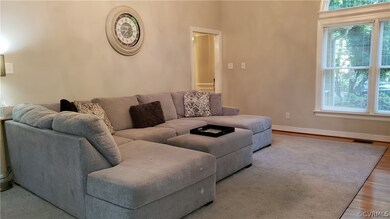 Vaulted ceilings. Lots of natural light. Hardwood