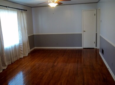 Note the newly refinished hardwood floors, and the