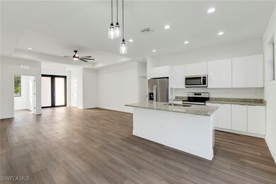 Kitchen with appliances with stainless steel finis
