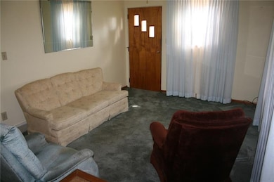 ANOTHER VIEW OF THE LIVING ROOM
