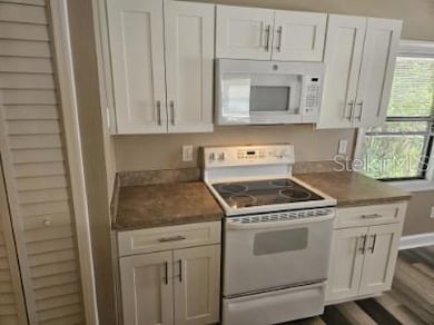 New Kitchen with White Shaker Style Cabinets