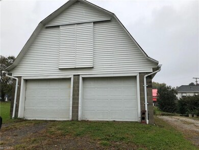 Great garage with additional parking space beside 