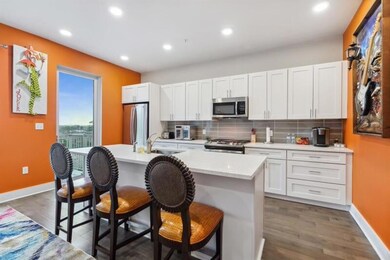 Island dining on sparkling Quartz countertops