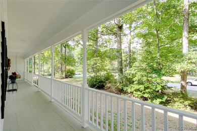 Porch wraps across the front, down the left side a