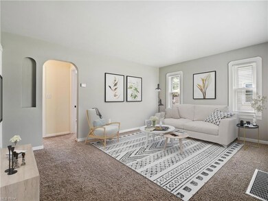 Virtually staged photo of the living room.