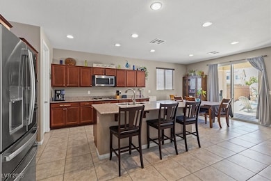 Kitchen with appliances with stainless steel finis