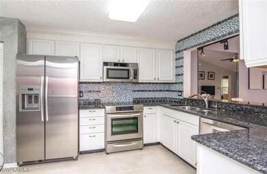 613 Squire Cir unit 202, Naples, FL 34104 - photo 5