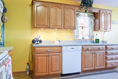 solid oak cabinets - solid surface counter tops
