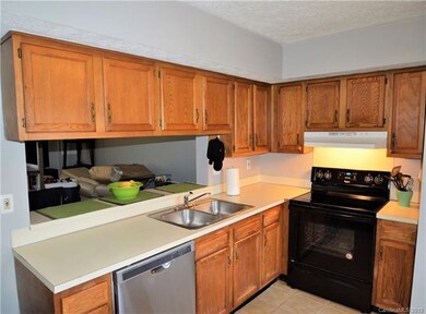 Kitchen With new pass through view of large living