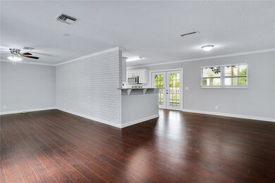 View from study area by front door of living room,