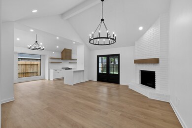 Vaulted ceilings highlight the open floor plan