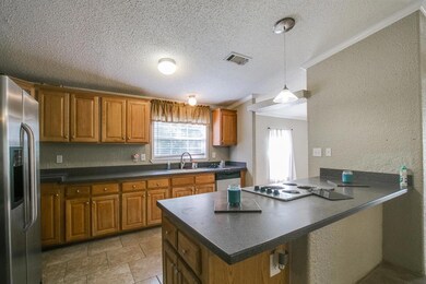 Large cooking countertop over looking living space