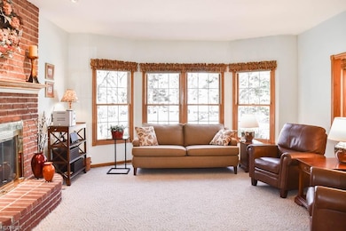Incredible family room with fireplace, bay window 