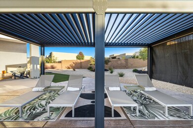 Fenced backyard featuring a pergola and a patio