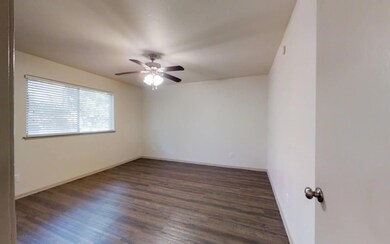 Unfurnished room featuring dark hardwood / wood-st
