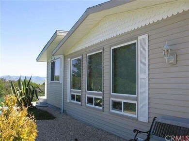 Front of home and office with large view windows f