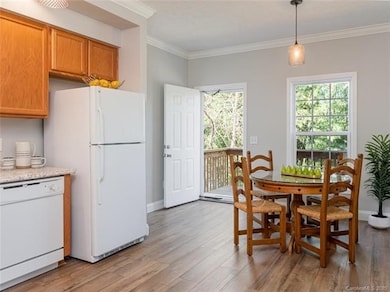 Kitchen/ Dining Room in 35 Wilmington Street located in West Asheville. This is a 3 Bedroom, 2 Bathroom, 1088 SQ FT home isLiving Room at 35 Wilmington Street located in West Asheville. This is a 3 Bedroom, 2 Bathroom, 1088 SQ FT home that is move-in