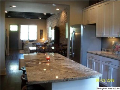 ANOTHER VIEW OF THIS AWESOME OPEN KITCHEN WITH REC