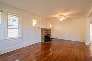 Shiny wood floors & high woodwork trim!