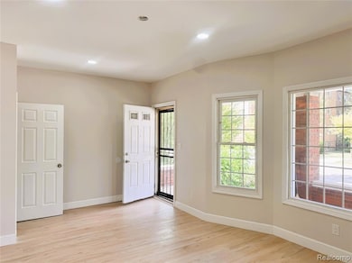 Unfurnished room featuring recessed lighting and light wood-style flooring