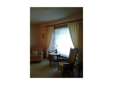 Large living area just off entry. Nice big window 