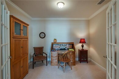 French doors lead into the downstairs dedicated office space.