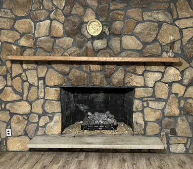 Beautiful stone fireplace with mantle!