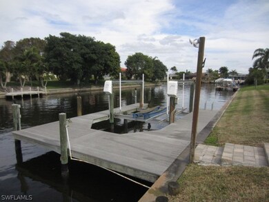 boat dock with view of intersecting canals