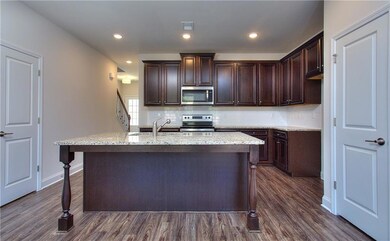 Kitchen featuring appliances with stainless steel 
