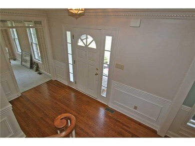 Entry/Foyer. Side lights flank the entry door, pro