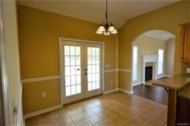 BREAKFAST ROOM - ARCHWAY TO GREAT ROOM - FRENCH DO
