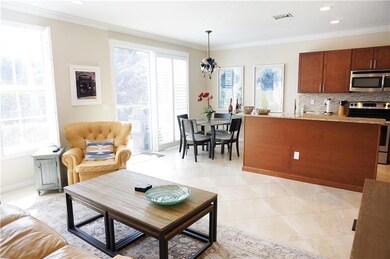 LIVING ROOM WITH BREAKFAST AREA AND KITCHEN