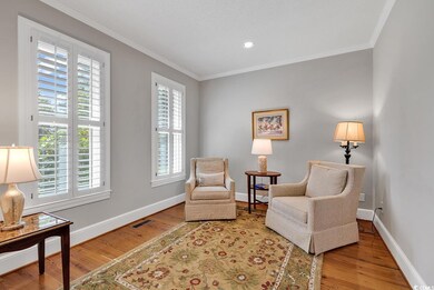 Living area with hardwood / wood-style flooring, p