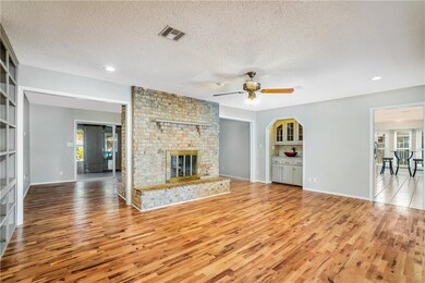NEW hardwood floors in the 2 living areas, dining,