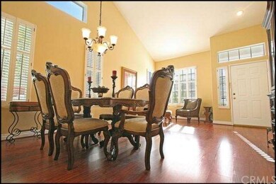 Formal dining room with chandelier and custom plan
