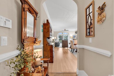 Hallway with light hardwood / wood-style flooring 