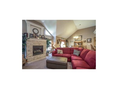 Open Great Room with Dry Stack Stone Fireplace.