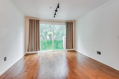 Another view of the living room with crown molding