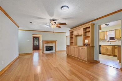 Family room with gas fireplace & built-ins