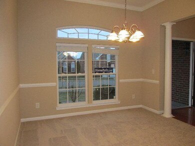 Formal Dining Room located off Foyer and connects to Kitchen
