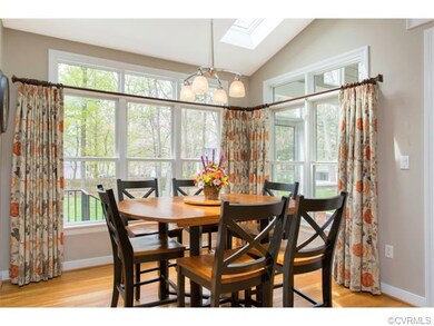 Bright Breakfast Nook overlooking the backyard.