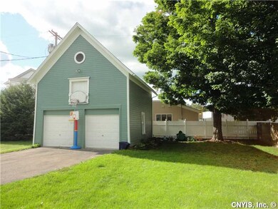 Garage. Two story, 2 car detached garage & partial