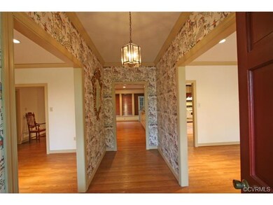 Foyer opens to the Living Room, Dining Room and Fa