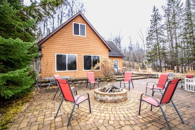 View of patio / terrace featuring a fire pit